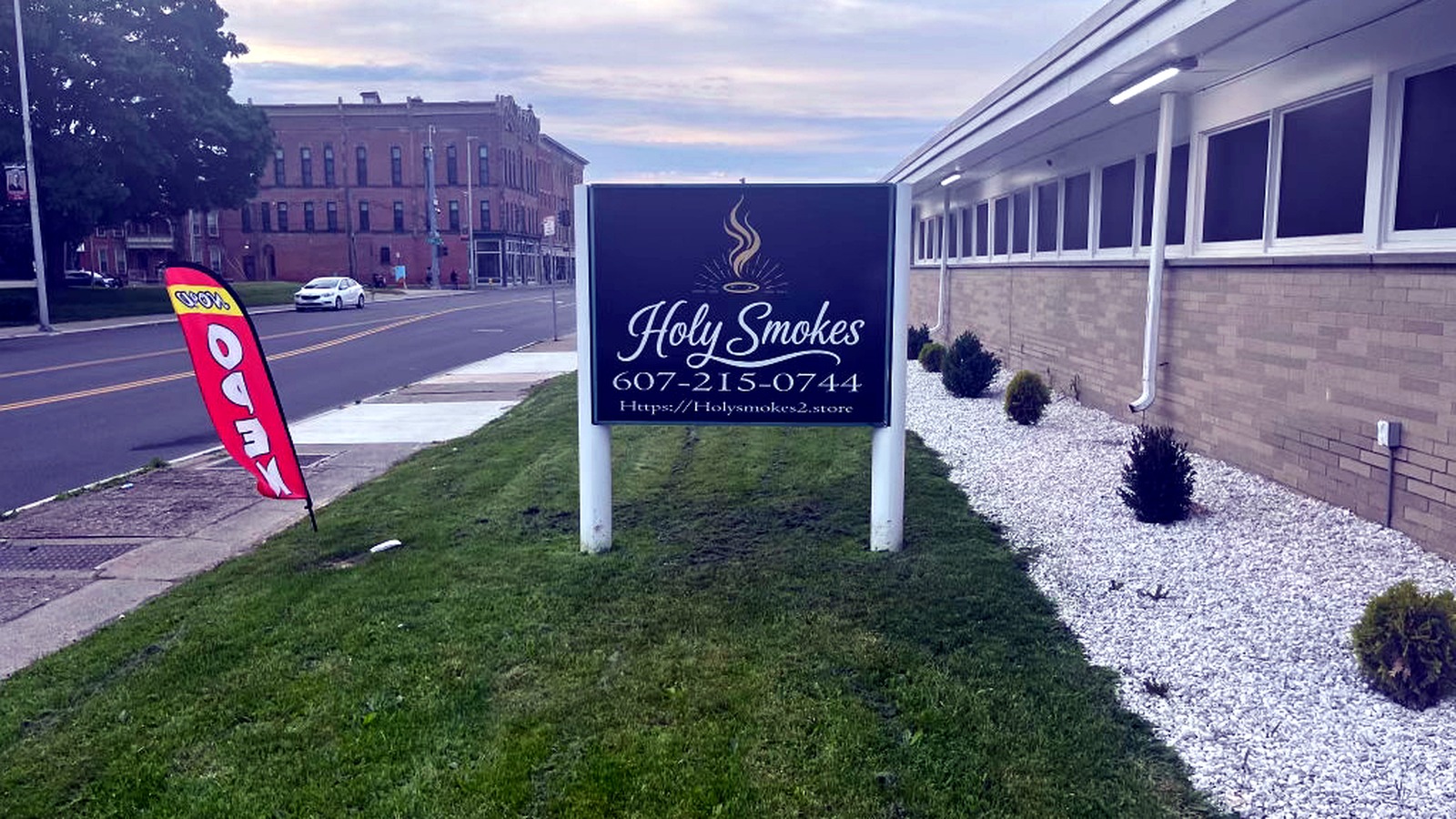 Holy Smokes exterior sign in Elmira